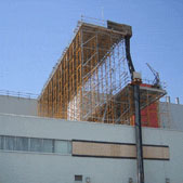Scaffolding on top of an industrial building